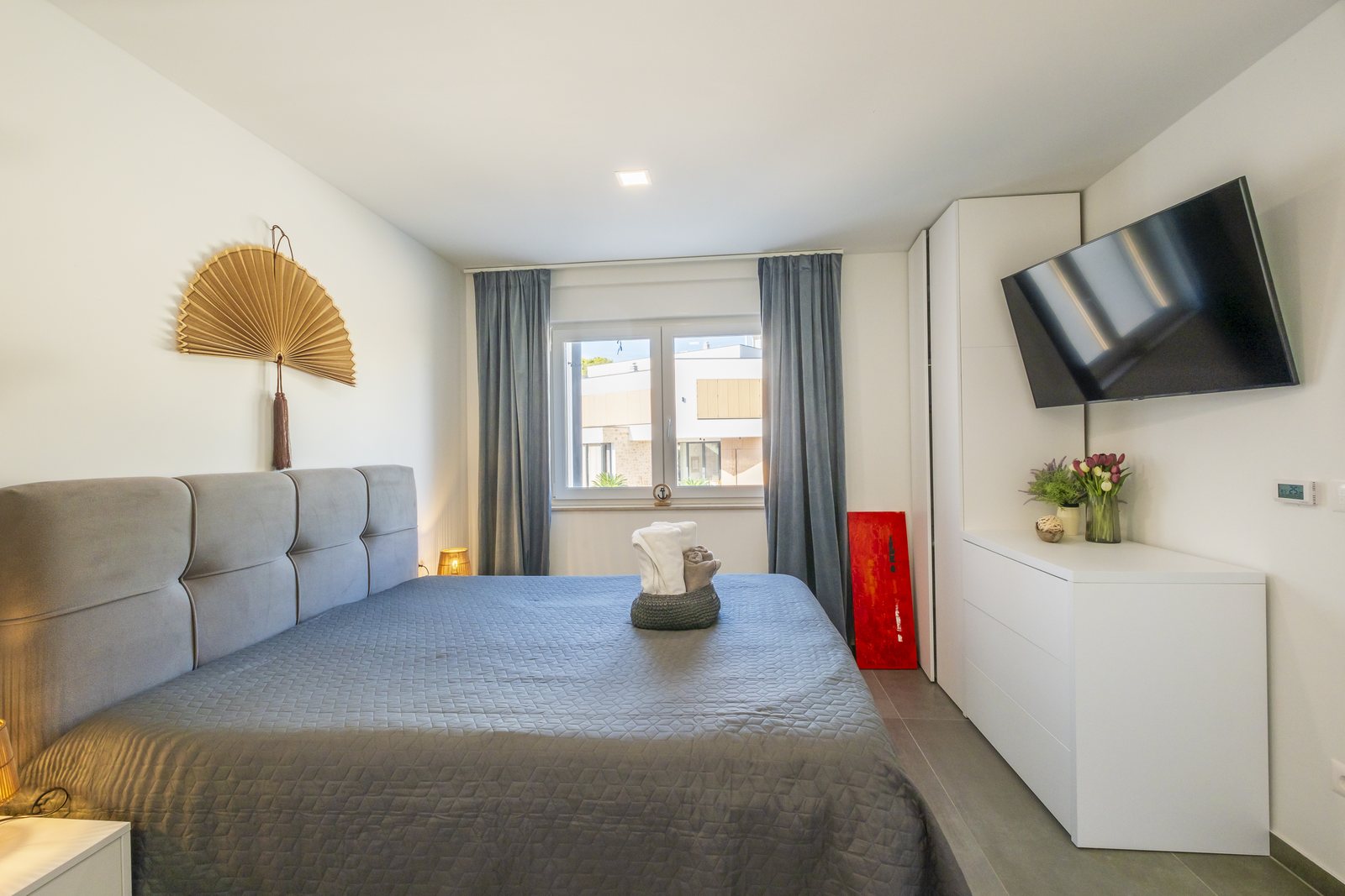 Bedroom 3, with the double bed and television