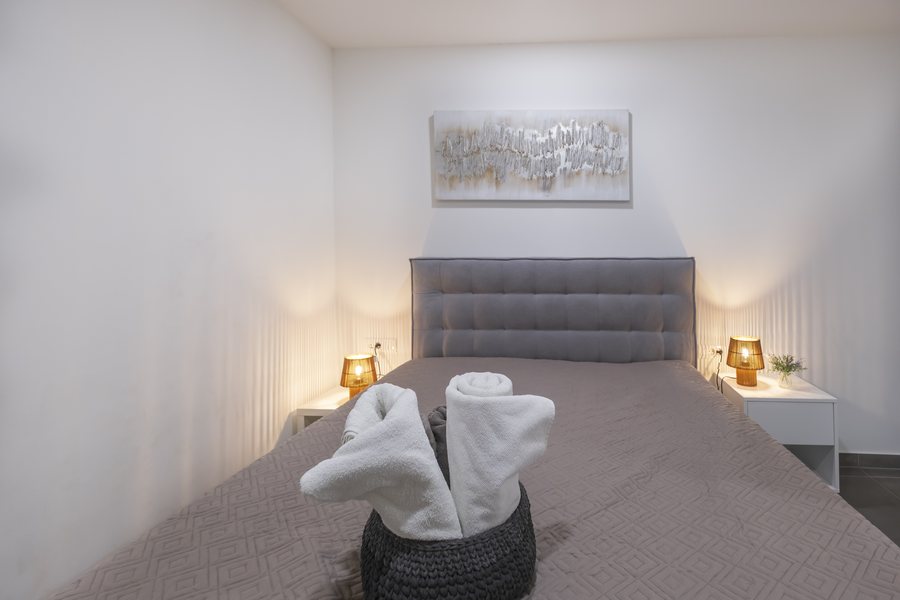 Bedroom 4, the inner room by the second kitchen, with the double bed made up