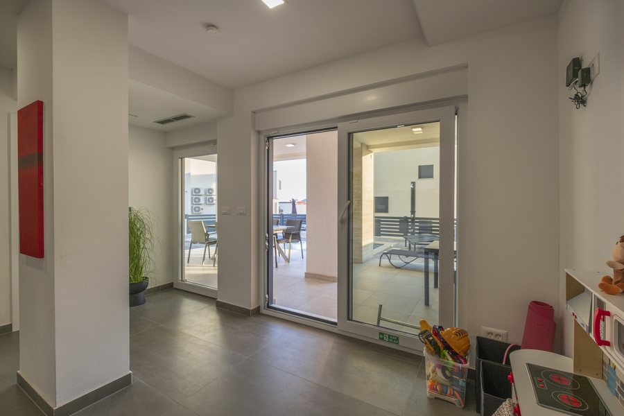 Glass doors from this floor out to the terrace