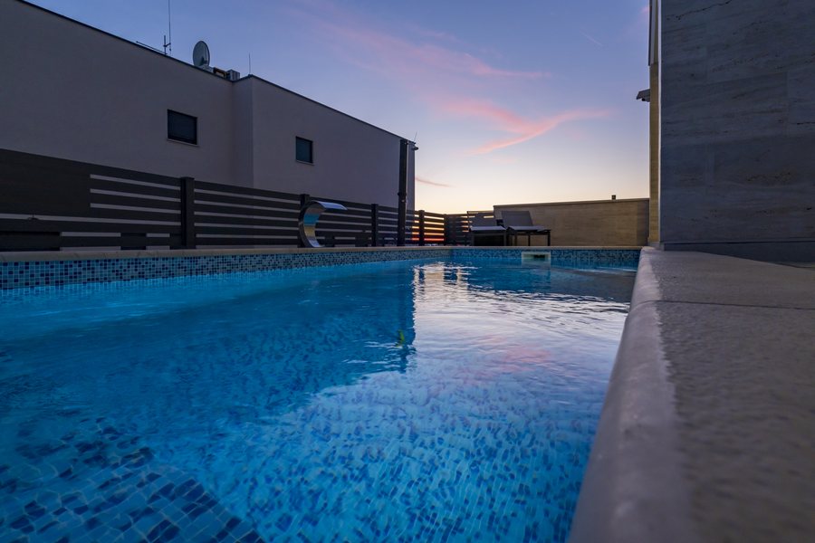The pool in the blue hour, from the water's edge