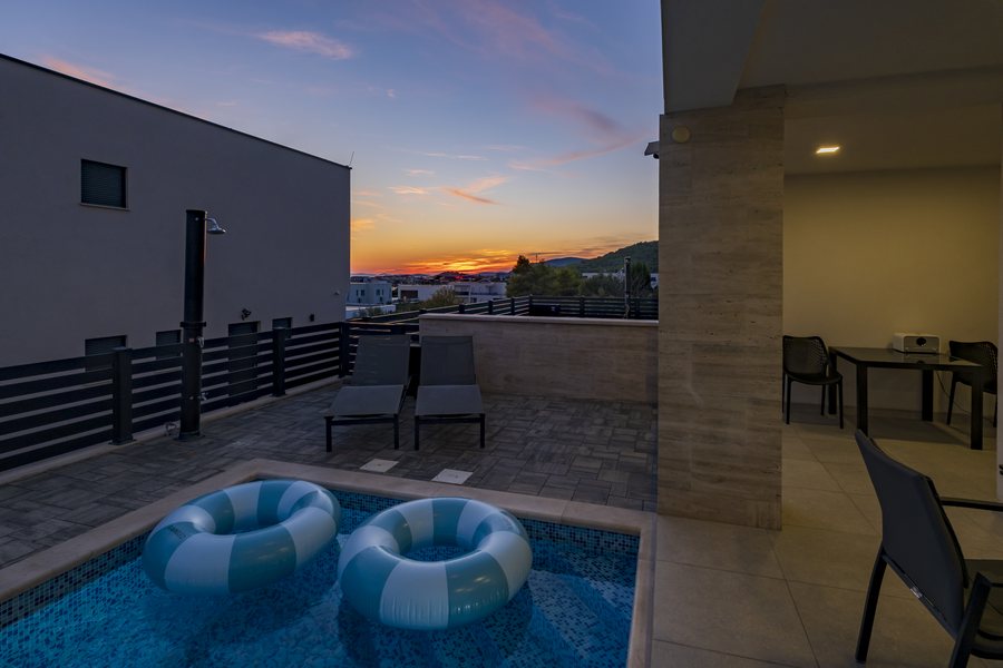Pool rings on the water at sunset